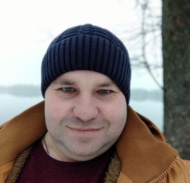 Николай